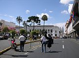 Ecuador Quito 02-08 Old Quito Plaza Grande City Hall And Basilica The City Hall on the far right was built in 1952 and has a low horizontal design and white walls. Up the street is the Baslica del Voto Nacional, the tallest church in Ecuador with its twin 115m towers.